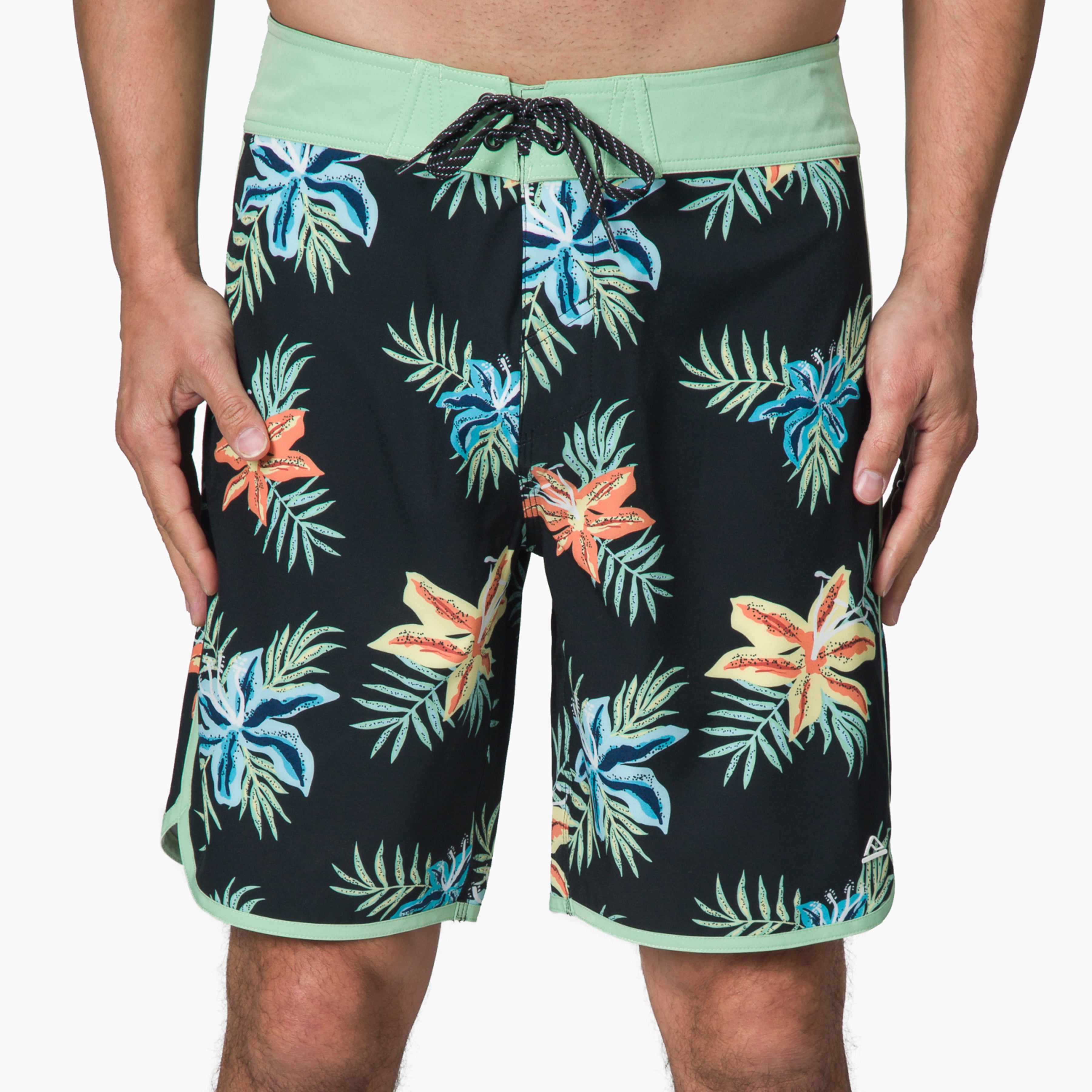 mens board shorts with Hawaiian flowers in black and green