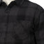 Close-up of the chest pocket and buttons on the Reggie Flannel Shirt in dark gray plaid from StoreRank.ai All Products.