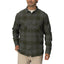 Man wearing a dark green and gray plaid Reggie Flannel Shirt with chest pockets, styled casually for cool weather.