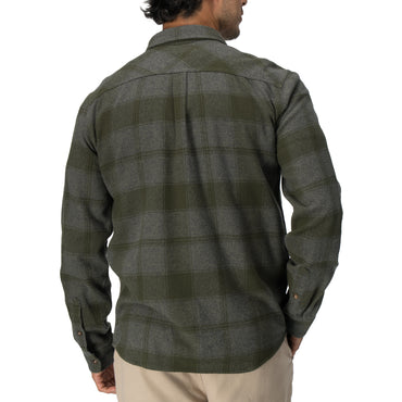 Back view of a man wearing the Reggie Flannel Shirt in muted green plaid, showcasing durable, comfortable apparel from StoreRank.ai All Products.