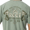 Back view of Twining Short Sleeve Tee featuring vintage Reef logo with mermaids and anchor on faded green fabric.