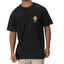Man wearing a relaxed fit black Salty Short Sleeve Tee with vintage skull and bucket hat artwork on chest, beach apparel.