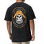 Back view of a man wearing a black Salty Short Sleeve Tee featuring vintage skull and hat artwork, coastal style apparel.