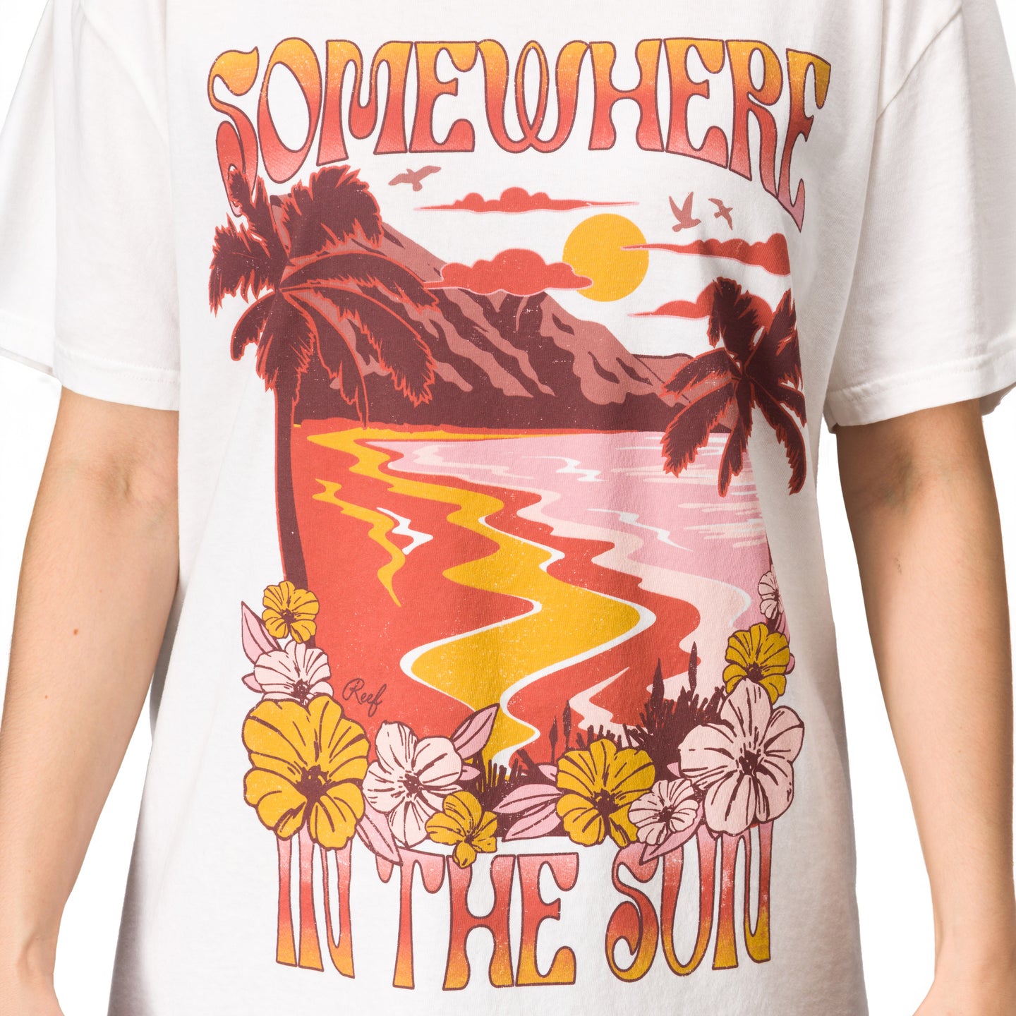 Front view of the Lia Boyfriend Crew tee with sun-faded beach graphic and bold "Somewhere in the sun" print.