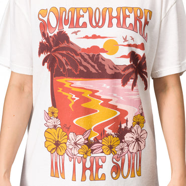 Front view of the Lia Boyfriend Crew tee with sun-faded beach graphic and bold "Somewhere in the sun" print.
