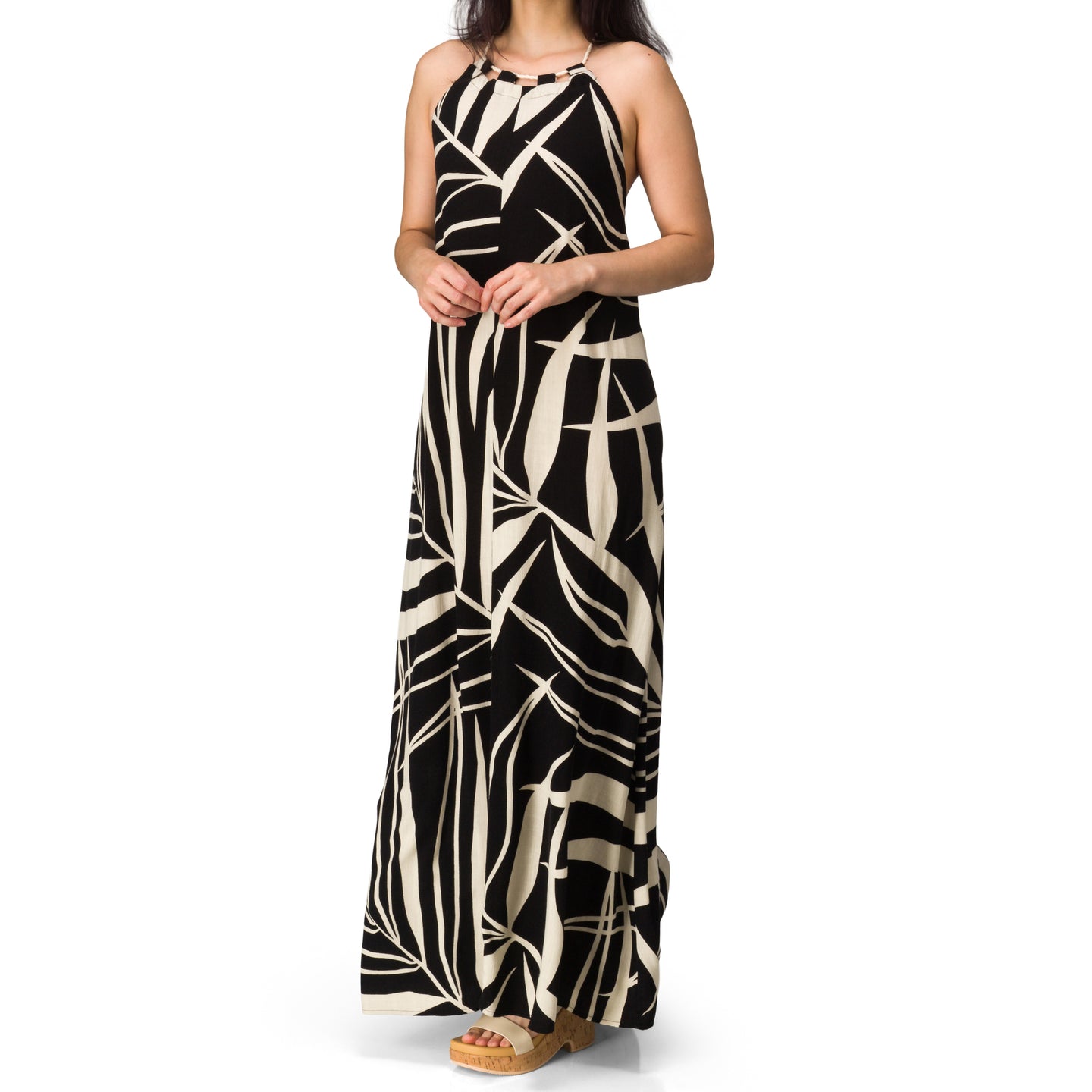 Woman wearing Tori Linen Maxi Dress with black and white abstract print, standing in full length, front view, StoreRank.ai All Products.