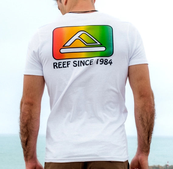 Image of Man on beach with Reef T-Shirt