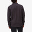 Back view of a man wearing the Raymond Ls Shirt in dark gray, showcasing its casual, surf-inspired comfortable apparel style.