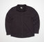 Front view of the Raymond Ls Shirt in dark fabric, featuring button closures and dual chest pockets.