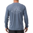 Back view of men’s Set In Performance Shirt in blue with sun skull graphic, designed for beach comfort and durability.