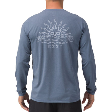 Back view of men’s Set In Performance Shirt in blue with sun skull graphic, designed for beach comfort and durability.