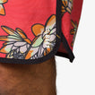Close-up of Tanner Boardshort hem with floral print and REEF logo, designed for comfort and beach lifestyle.