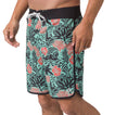 Front view of men's Fayder Boardshort in teal with coral floral print and black waistband, beach-inspired comfort design.