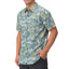 Men wearing Eugene Woven Shirt in blue floral pattern, shown from front with hand in pocket, beach-inspired comfort apparel.