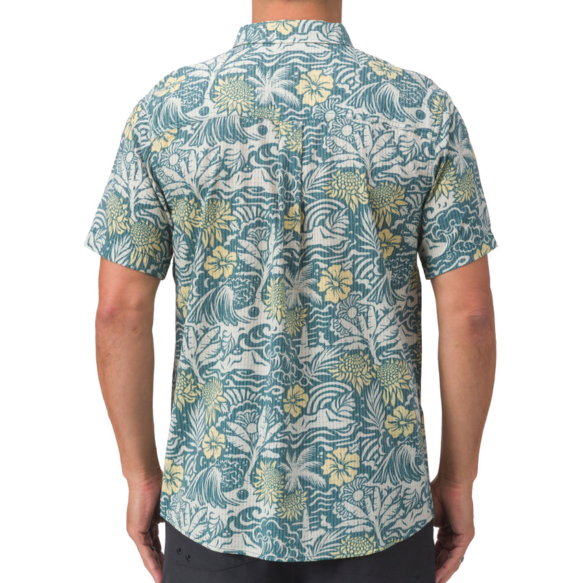 Back view of Eugene Woven Shirt in green floral pattern, perfect for beach-inspired, comfortable men's apparel.