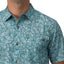 Close-up of the chest and collar on a Hartman Woven Shirt featuring a blue seashell pattern and wooden buttons.