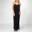 Woman wearing a black Plisse Dress standing straight with relaxed arms, showcasing the dress’s flowy, comfortable fit.