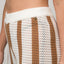 Close-up of the Mika Sweater Pant's knit fabric showing white and tan vertical stripes and waistband detail