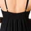 Back view close-up of Yuni Maxi Dress showing lightweight textured cotton fabric and delicate adjustable straps.