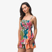 Woman wearing colorful Eve Cami Top with adjustable straps, showing front view, perfect for beach and active lifestyles.