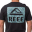 Back view of man wearing Shells Tee in black with blue shell patterned REEF logo, surf-inspired comfortable men’s apparel.