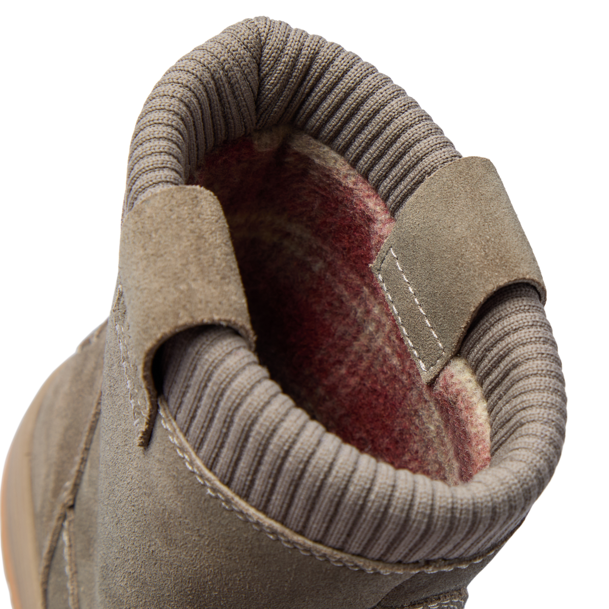 Campfire Ember close up of the heel collar facing forward with soft lining and stitched panels