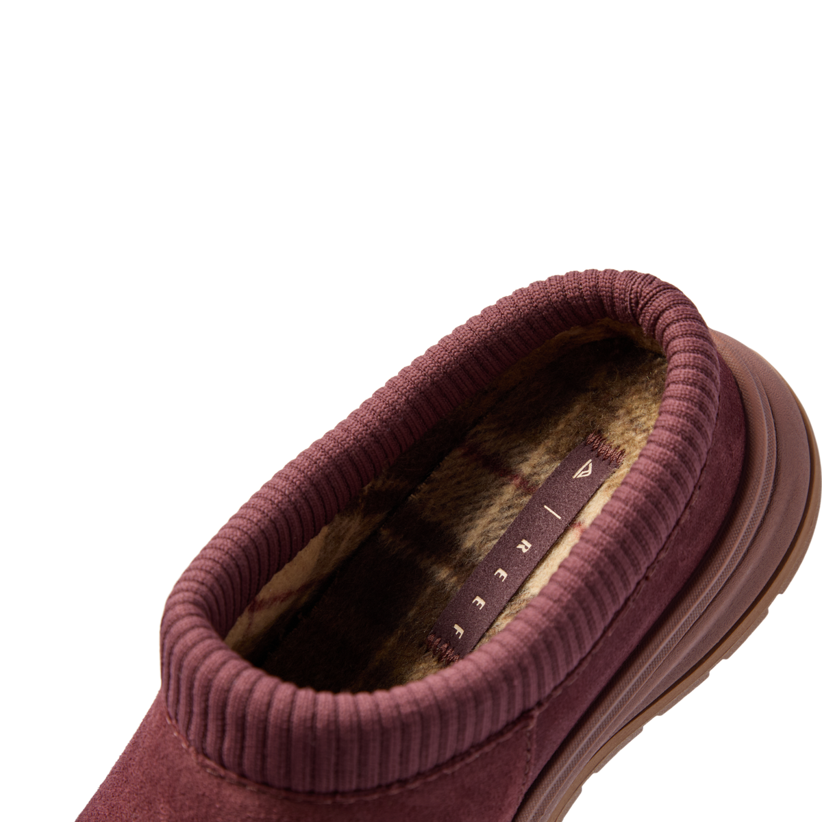 Campfire Lodge clog facing lower left, close-up of the plush plaid-lined opening and cushioned collar