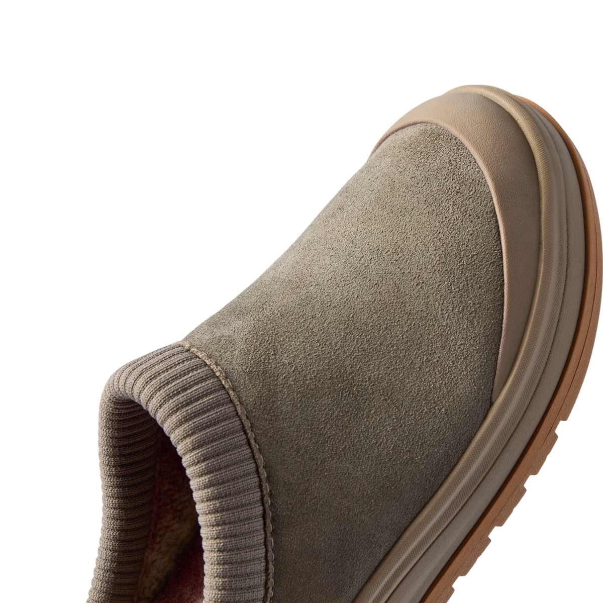 Campfire Lodge clog facing right in close-up, showing its premium suede upper and soft plaid-lined opening