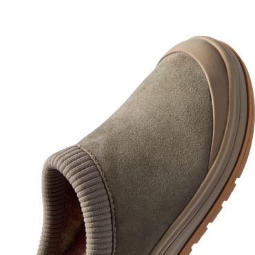 Campfire Lodge clog facing right in close-up, showing its premium suede upper and soft plaid-lined opening