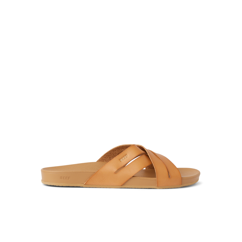 Cushion Spring Bloom sandal facing right, tan vegan leather straps, lightweight footbed with arch support for beach comfort.