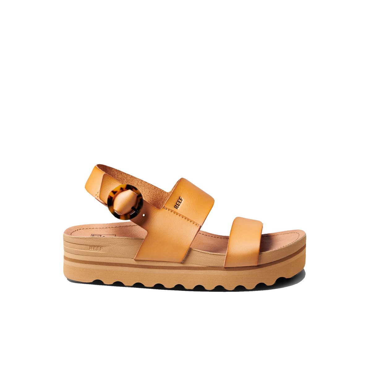 Vista Hi Buckle women's tan platform sandal facing right with vegan leather straps, slingback design and tortoise buckle