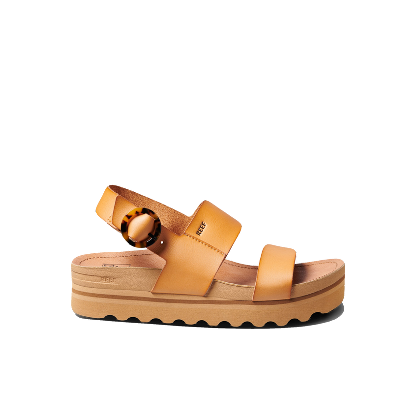 Vista Hi Buckle women's tan platform sandal facing right with vegan leather straps, slingback design and tortoise buckle