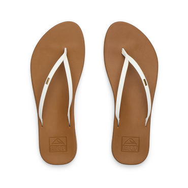 Top view of women's Cushion Slim flip flops in tan footbed with white straps, lightweight, water-friendly beach sandals.