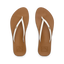 Top view of women's Cushion Slim flip flops in tan footbed with white straps, lightweight, water-friendly beach sandals.