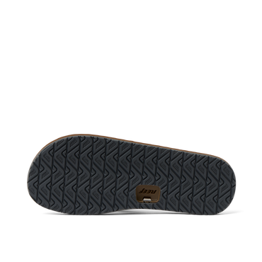 Reef Draftsmen men's sandal outsole facing right with textured traction tread and cushioned footbed sides