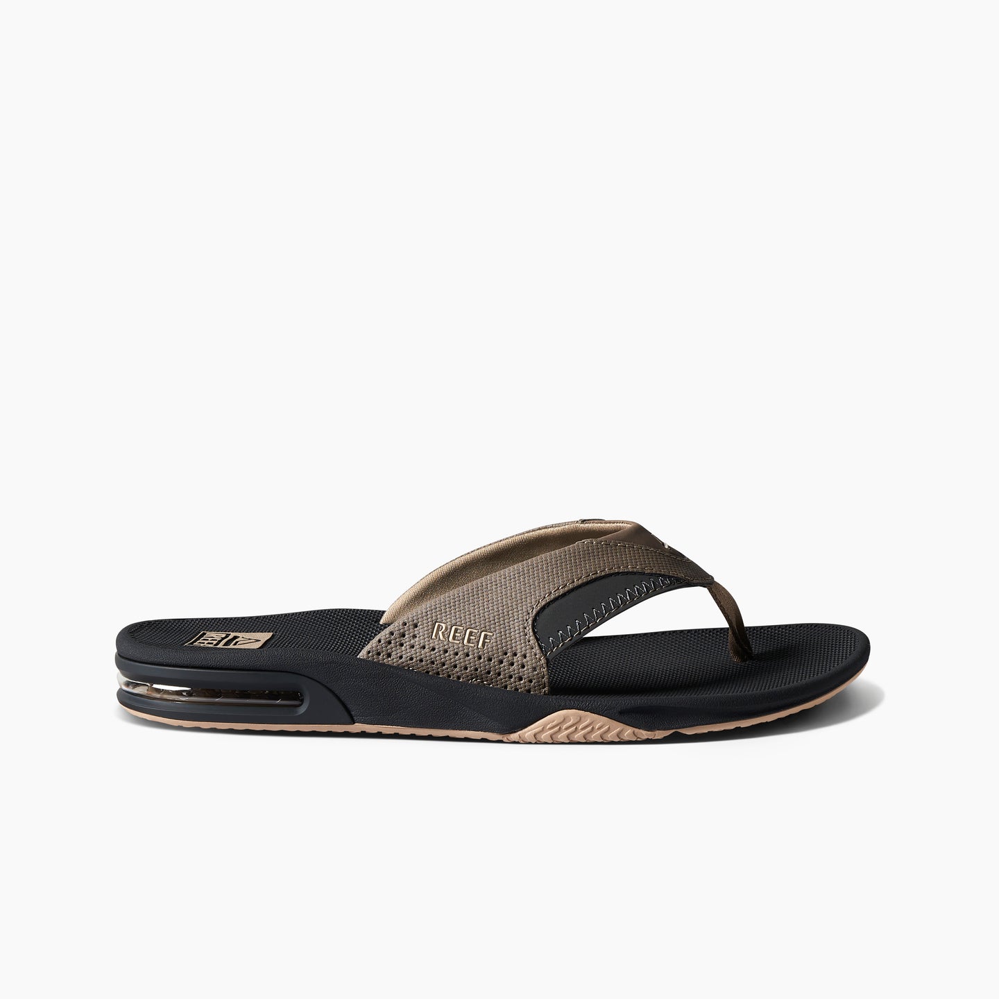 Side view of Fanning men's flip flop sandal in fossil and raven, featuring anatomical arch support and soft cushioning.