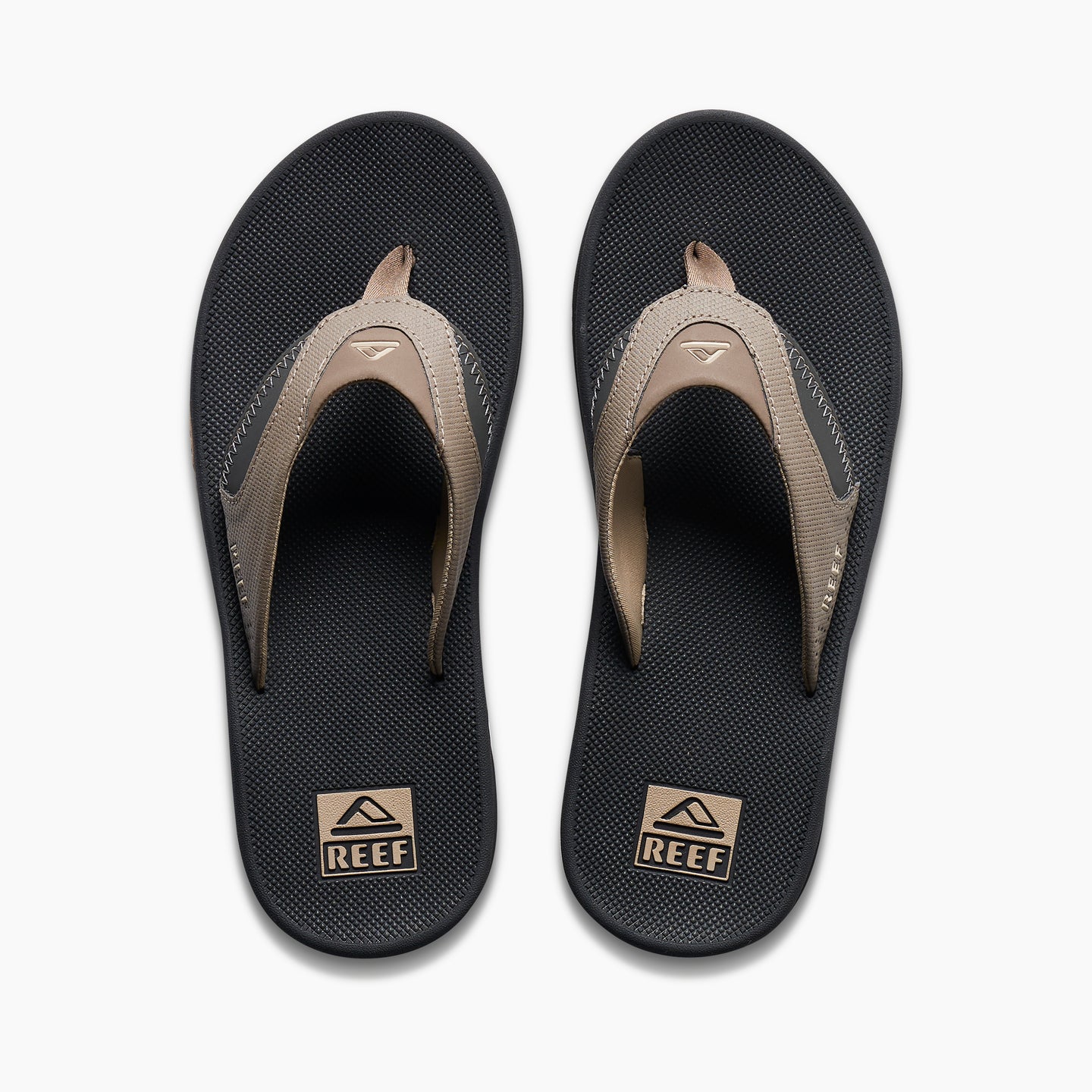 Top view of Fanning men's black and fossil brown sandals with extra cushioning and arch support for beach comfort.