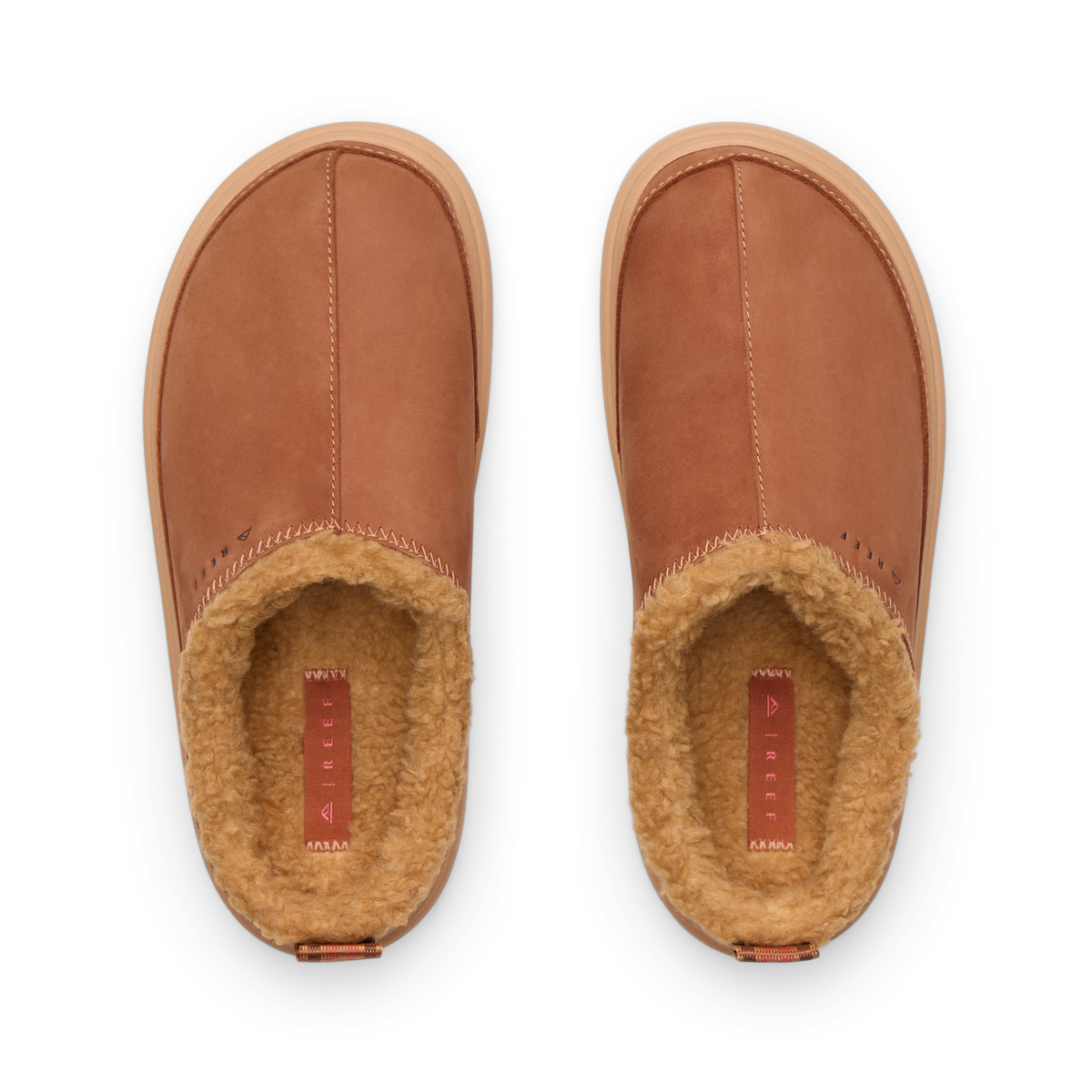 REEF Weekend Low Brooke shoes shown with toes facing upward and cozy sherpa lined footbeds for comfort