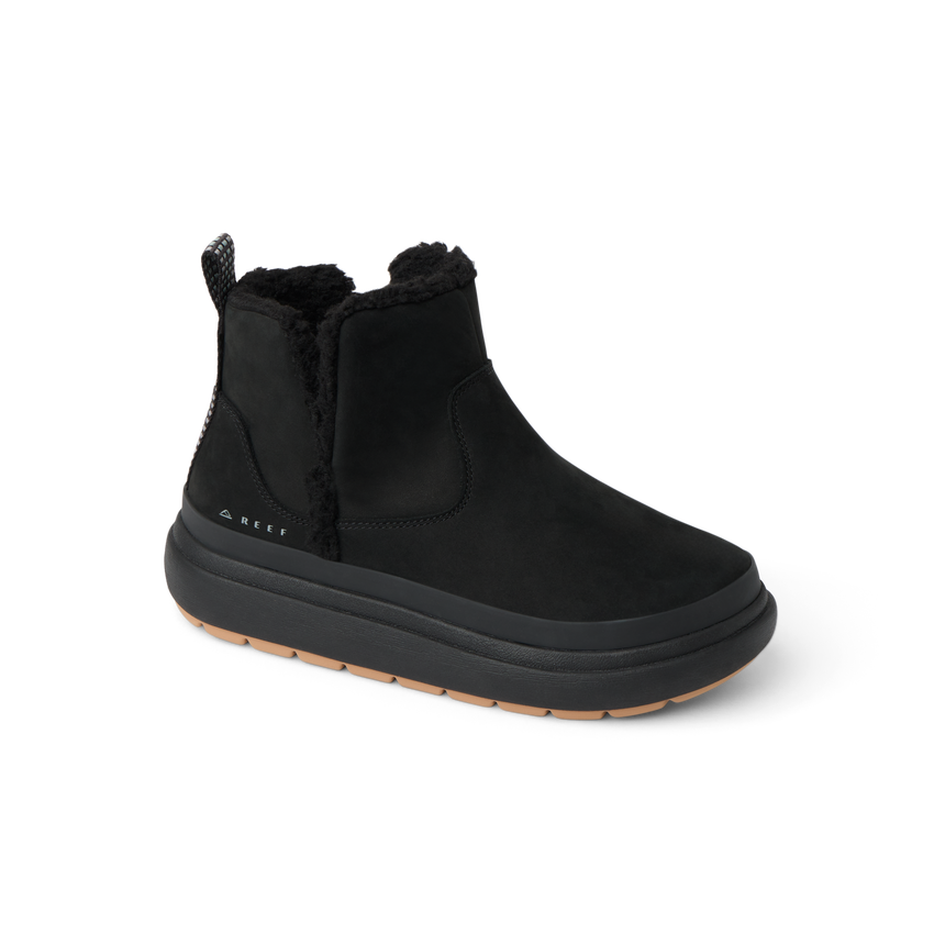 Black ankle boot facing right, with plush fleece lining and a thick textured rubber sole.