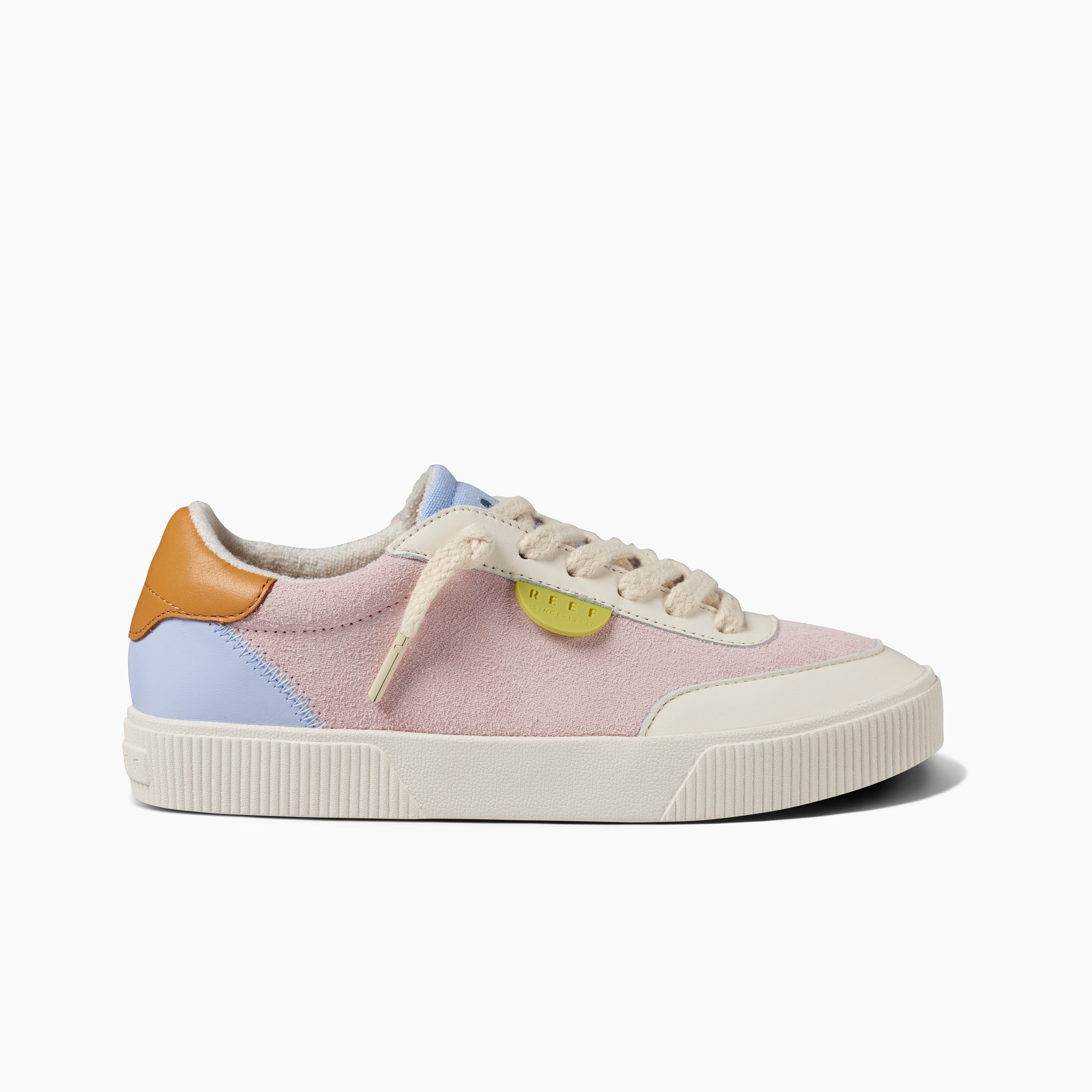 womens sneakers in light purple, blue, yellow, white and leather side view