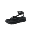 Vista Luxe Sierra black women's sandal facing left, close-up of cushioned footbed and ankle strap for beach comfort.