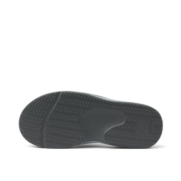 Fanning H2O grey flip flop close up with the textured outsole facing the camera for water friendly traction