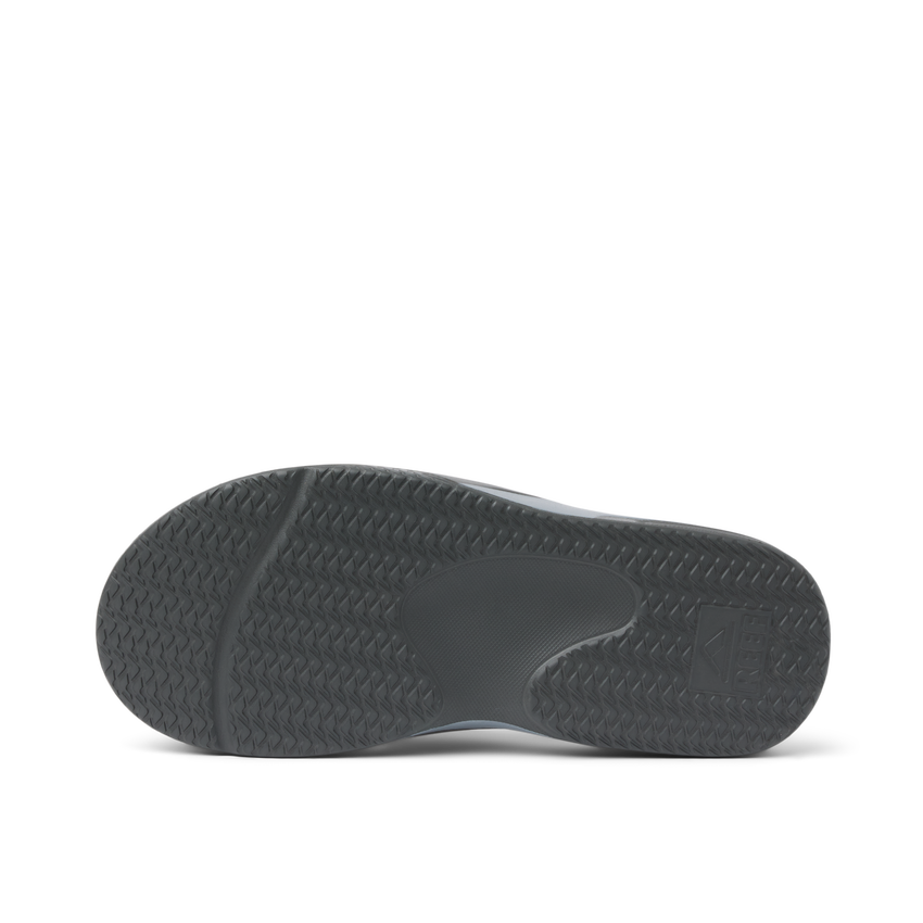 Fanning H2O grey flip flop close up with the textured outsole facing the camera for water friendly traction