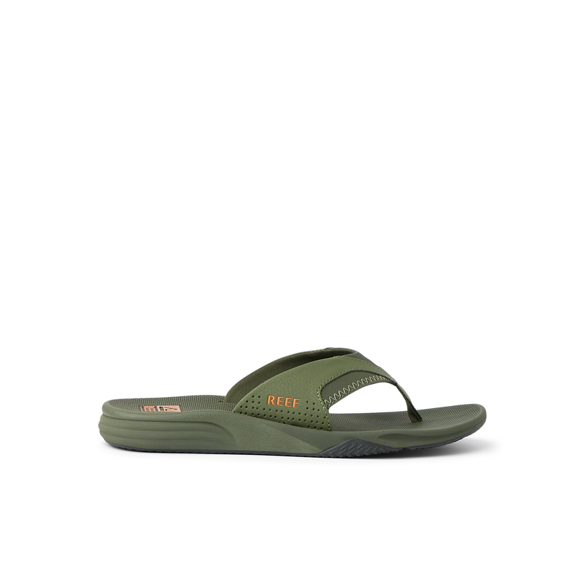 Side view of green Cushion Fanning flip flop sandal with anatomical arch support and soft cushioning for beach comfort