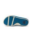 Cruiser men’s shoe sole facing up, showing blue rubber outsole with wave pattern and brand logo, surf-inspired comfort design.