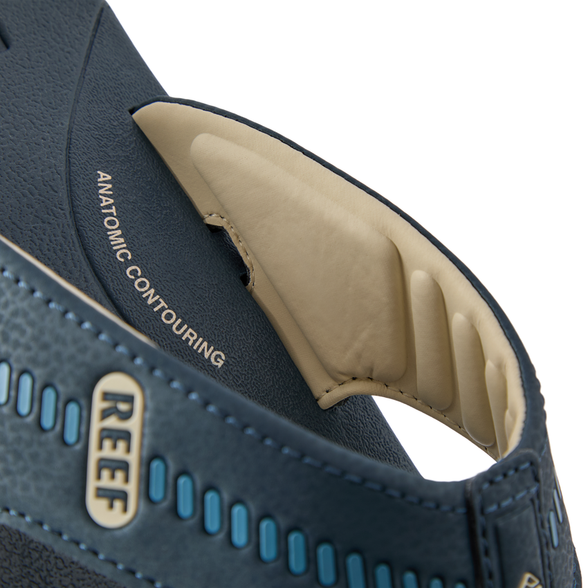 Close-up of the Cruiser sandal heel facing left, showing anatomical arch support and soft cushioning in midnight navy color.