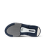 Fanning + men's shoe showing sole with durable, water-friendly materials and anatomical arch support, facing upward.