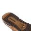 Fanning + men's shoe sole facing up, showing durable tread and comfort-focused cushioning with arch support features.
