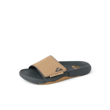 Phantom Slab slide facing right, close-up of water-friendly cushioned footbed and tan strap with arch support.