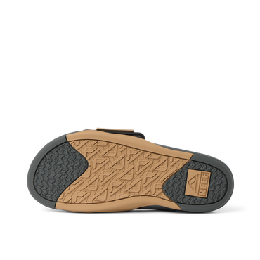 Phantom Slab men's slide sandal sole facing up, showing durable tread with water-friendly, beach-inspired design.